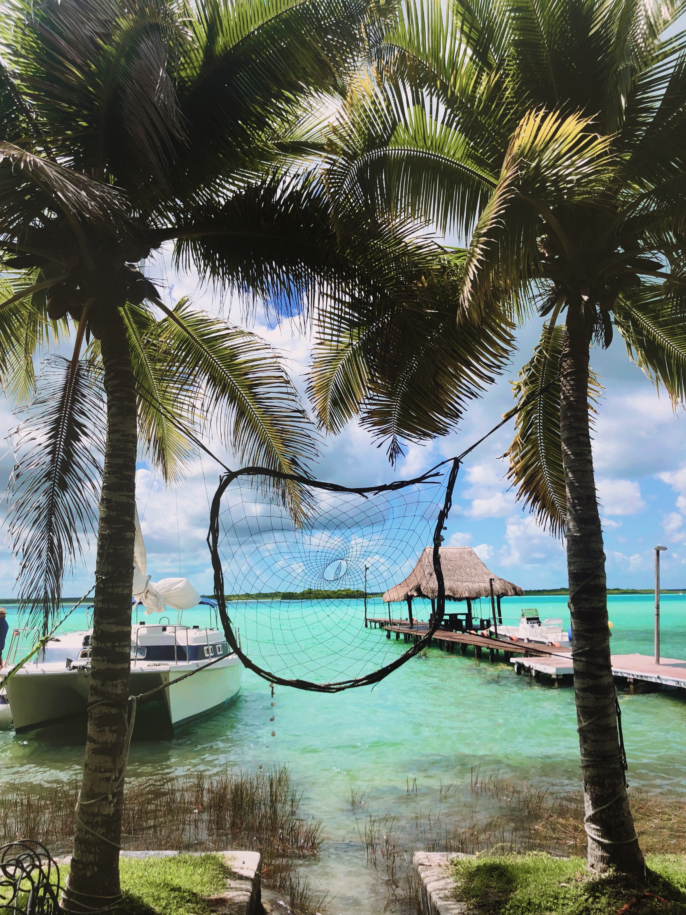 A dream catcher on the shore of Bacalar Lagoon in Bacalar, Mexico